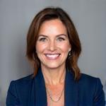Professional portrait of Elena Petrova, Lead Funding Consultant